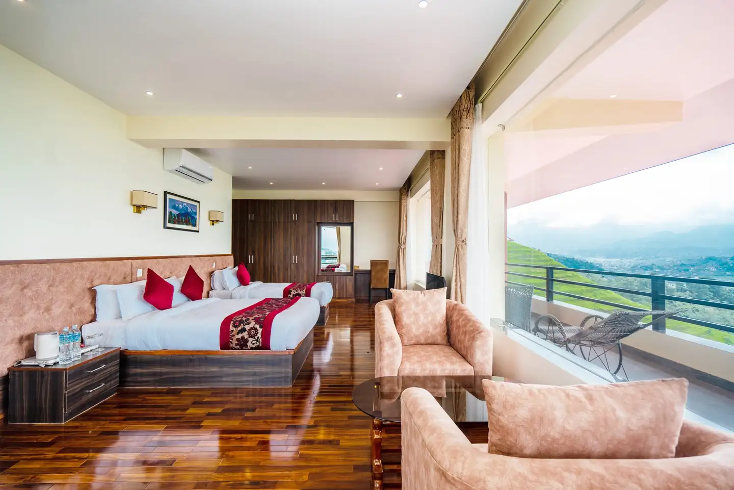 A suite at Sky Garden Resort, its windows filled with forested hillside